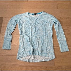 Long sleeve blue shirt.
